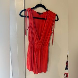 Orange romper - size small